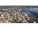 Aerial view showing a neighborhood near the water, featuring various houses and landscaping at 1600 Pennsylvania Ne Ave, St Petersburg, FL 33703