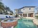 Inviting backyard with pool, spa, and patio at 1600 Pennsylvania Ne Ave, St Petersburg, FL 33703