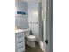 Renovated bathroom featuring a walk-in shower at 1600 Pennsylvania Ne Ave, St Petersburg, FL 33703