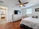 Bedroom with a double bed, dresser, and hardwood floors at 1600 Pennsylvania Ne Ave, St Petersburg, FL 33703