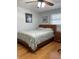 Bright bedroom featuring wood floors and ceiling fan at 1600 Pennsylvania Ne Ave, St Petersburg, FL 33703