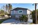 Two-story house with a two-car garage and stone accents at 1600 Pennsylvania Ne Ave, St Petersburg, FL 33703