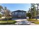 Contemporary two-story home with a two-car garage and stone accents at 1600 Pennsylvania Ne Ave, St Petersburg, FL 33703