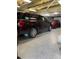 Spacious garage with epoxy flooring and room for multiple vehicles at 1600 Pennsylvania Ne Ave, St Petersburg, FL 33703