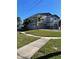 Two-story house exterior with double garage and landscaping at 1600 Pennsylvania Ne Ave, St Petersburg, FL 33703