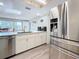 Modern kitchen with stainless steel appliances and granite countertops at 1600 Pennsylvania Ne Ave, St Petersburg, FL 33703