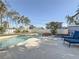 Inviting pool and spa area with lounge chairs in backyard at 1600 Pennsylvania Ne Ave, St Petersburg, FL 33703