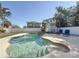 Enjoy this beautiful, kidney-shaped pool and spa at 1600 Pennsylvania Ne Ave, St Petersburg, FL 33703