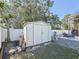 White shed in backyard provides extra storage at 1600 Pennsylvania Ne Ave, St Petersburg, FL 33703