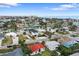 Aerial view of home and neighborhood, showcasing waterfront location at 16015 Redington Dr, Redington Beach, FL 33708