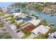 Aerial view of waterfront home with private dock and boat access at 16015 Redington Dr, Redington Beach, FL 33708