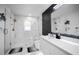 Modern bathroom with marble shower and double vanity at 16015 Redington Dr, Redington Beach, FL 33708