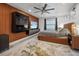 Main bedroom with a king-size bed and wood wall accents at 16015 Redington Dr, Redington Beach, FL 33708