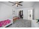 Spacious bedroom with a walk-in closet and gray carpeting at 16015 Redington Dr, Redington Beach, FL 33708