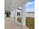 Modern covered walkway leading to a house entrance at 16015 Redington Dr, Redington Beach, FL 33708