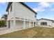 Contemporary home with covered walkway and carport at 16015 Redington Dr, Redington Beach, FL 33708