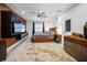 Spacious main bedroom with large TV and wood wall accents at 16015 Redington Dr, Redington Beach, FL 33708