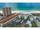 Aerial view of beachfront building and parking at 17980 Gulf Blvd # 501, Redington Shores, FL 33708