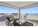 Relaxing balcony with ocean view and seating at 17980 Gulf Blvd # 501, Redington Shores, FL 33708