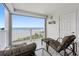 Oceanfront balcony with seating for relaxing and enjoying the view at 17980 Gulf Blvd # 501, Redington Shores, FL 33708