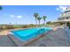 Relaxing rectangular pool with ocean views and lounge chairs at 17980 Gulf Blvd # 501, Redington Shores, FL 33708