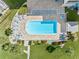 Overhead view of refreshing rectangular pool with lounge chairs at 17980 Gulf Blvd # 501, Redington Shores, FL 33708