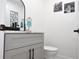 Clean bathroom with gray vanity and marble top at 19029 Us Highway 19 N # 6-16, Clearwater, FL 33764