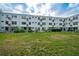 Complex featuring a large grassy backyard at 2256 Philippine Dr # 18, Clearwater, FL 33763