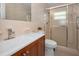 Clean bathroom with updated vanity, shower, and toilet at 2256 Philippine Dr # 18, Clearwater, FL 33763