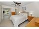 Comfortable bedroom with ceiling fan and built-in dresser at 2256 Philippine Dr # 18, Clearwater, FL 33763