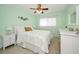 Light and airy bedroom with a queen bed and white dresser at 2256 Philippine Dr # 18, Clearwater, FL 33763