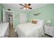 Bright bedroom with a comfortable bed and access to a hallway at 2256 Philippine Dr # 18, Clearwater, FL 33763