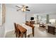 Charming dining area with wood table and four chairs at 2256 Philippine Dr # 18, Clearwater, FL 33763