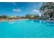 Sparkling community pool with plenty of lounge chairs at 2256 Philippine Dr # 18, Clearwater, FL 33763