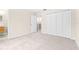 Bedroom with neutral walls, carpeted floor and large closet at 2547 Lexington Oak Dr, Brandon, FL 33511