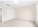 Well-lit bedroom with neutral walls and carpeted floor at 2547 Lexington Oak Dr, Brandon, FL 33511