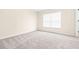 Bright bedroom with neutral walls and carpeted floor at 2547 Lexington Oak Dr, Brandon, FL 33511