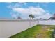 View of a backyard with a large beige privacy fence at 2564 89Th Street E Cir, Palmetto, FL 34221