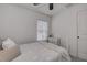 Bedroom with white metal bed frame and ceiling fan at 2667 89Th Street E Cir, Palmetto, FL 34221