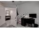 Home office with black desk and monitor, well-lit space at 2667 89Th Street E Cir, Palmetto, FL 34221