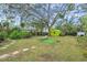 Backyard with a lounge chair and a swing at 2819 50Th S St, Gulfport, FL 33707