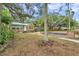 House exterior with stone facade and landscaping at 2819 50Th S St, Gulfport, FL 33707