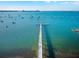 Long pier extending into the water with people walking at 2900 45Th S St # 22, Gulfport, FL 33711