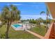 Community pool and patio area with lush landscaping and waterfront views at 2900 45Th S St # 22, Gulfport, FL 33711