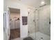 Bathroom with a large walk-in shower and linen closet at 3071 Marine Grass Dr, Wimauma, FL 33598