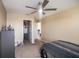 Spacious bedroom with a walk-in closet and access to the hall bath at 3071 Marine Grass Dr, Wimauma, FL 33598