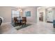 Dining room features a table for six and a chandelier at 31703 Cabana Rye Ave, San Antonio, FL 33576