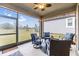 Relaxing screened porch with outdoor seating at 31703 Cabana Rye Ave, San Antonio, FL 33576