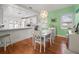 Kitchen with white cabinets, a checkerboard floor, and island at 320 N Madison Ave, Clearwater, FL 33755