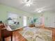 Spacious living area featuring hardwood floors and light walls at 320 N Madison Ave, Clearwater, FL 33755